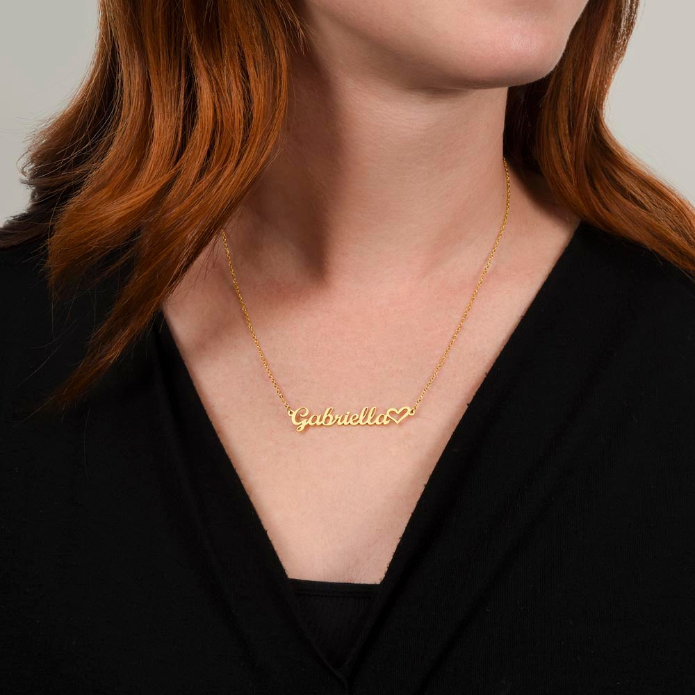 Heart name necklace.